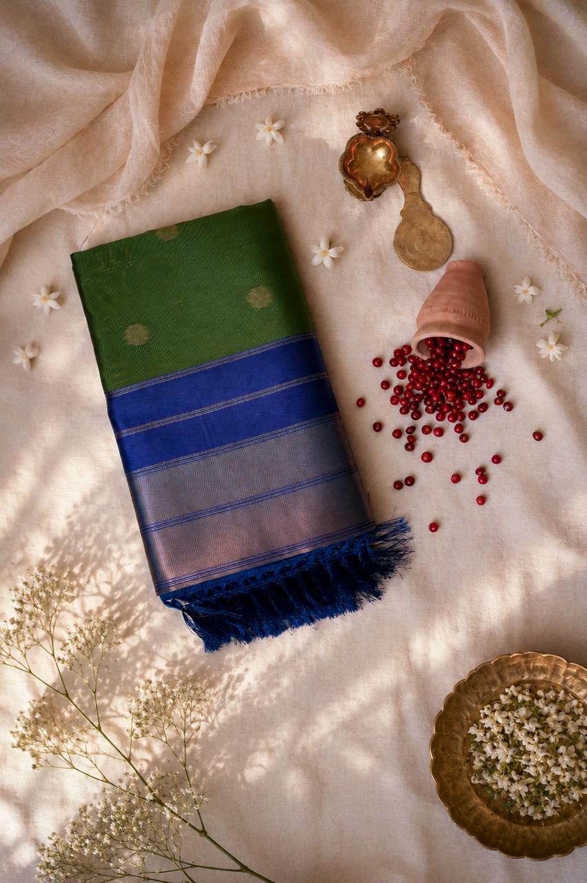 WhatsApp Image 2026-07-31 at 5.21.59 PM Premium Brocade Soft Silk Saree – Emerald Green with Royal Blue Saree Border - Image 1